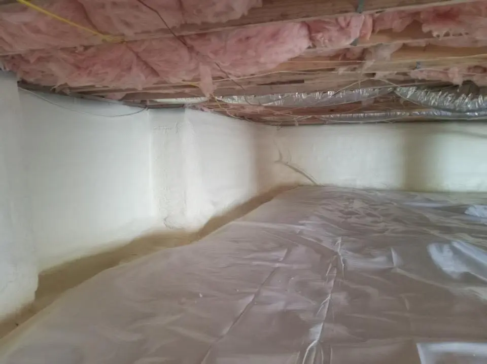 Crawl space encapsulation with closed-cell spray foam for Commercial Roof Restoration in Kennesaw